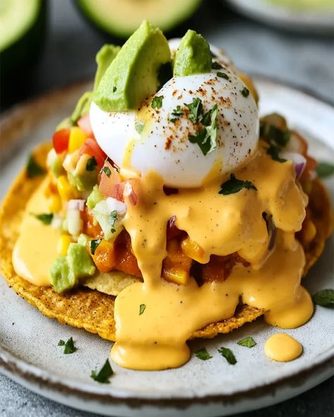 Spice up your brunch with this flavorful Mexican Eggs Benedict recipe featuring chorizo, avocado, and chipotle hollandaise sauce. Spanish Brunch Ideas, Eggs Benedict Ideas, Mexican Eggs Benedict, Mexican Eggs Benedict Recipe, Hispanic Breakfast, Chipotle Hollandaise Sauce, Mexican Brunch Ideas, Egg Benedict Recipe, Grilled Butternut Squash