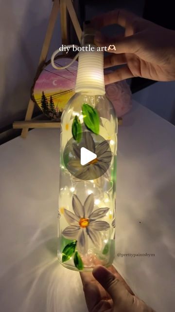 Mariyam♡ on Instagram: "painted florals this time🤍 . . . . . . (Diy art diy crafts diy bottle art bottle painting acrylic painting florals art) #diyart #diyprojects #diyhomedecor #diybottleart #bottlepainting #acrylicpainting #bottleartwork" Decorating Bottles Ideas, Diy Bottle Art, Bottle Art Projects, Art Bottle, Painted Florals, Diy Bottle Crafts, Diy Bottle, Bottle Painting, Hand Painting Art