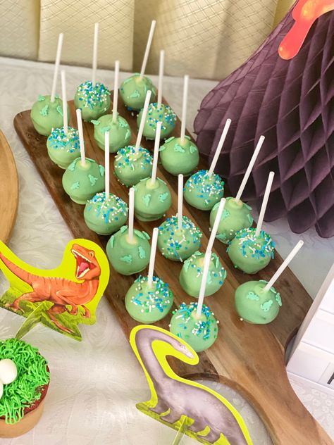 Dinosaur Birthday Party Dessert Table, Dinasour Cake Pop, Dino Party Table Decor, Diy Dino Decorations, Dinosaur Birthday Cake Pops, Cake Pop Dinosaur, Dinosaur Theme Cake Pops, Cake Pops Dinosaur, Dinosaur Birthday Snacks