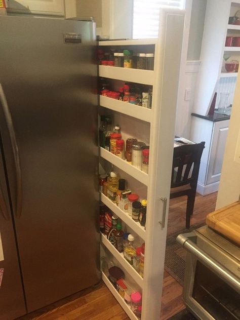 Custom Pull Out Spice Rack Tucked on the Side of Our Refrigerator. Side Of Fridge, Pantry Redo, Pull Out Spice Rack, Diy Spice Rack, Cabinet Trim, Kitchen Spice Racks, Diy Spices, Small Pantry, Pantry Ideas