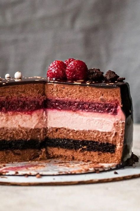 Chocolate raspberry mousse cake with a chocolate mirror glaze Chocolate Raspberry Mousse Cake, Chocolate Mirror Glaze, Raspberry Mousse Cake, Chocolate Crumbs, Chocolate And Raspberry, Raspberry Mousse, Sweet Dish, Raspberry Cake, Fancy Desserts