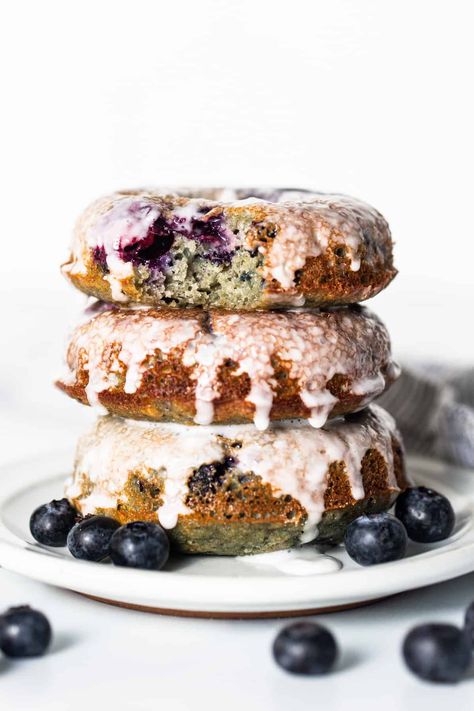 Blueberry Protein Donuts - Fit Foodie Finds Blueberry Cake Donut Recipe, Donut Photography, Cake Donut Recipe, Blueberry Doughnuts, Bakery Photography, Blueberry Cake Donuts, Doughnut Recipes, Donuts Recipes, Cake Donuts Recipe