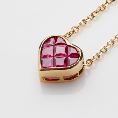 Metal: 18k yellow gold Gem: square-cut Rubies 1.63ctw Pendant Size: 9.5 x 10mm Chain Length: 16 inch