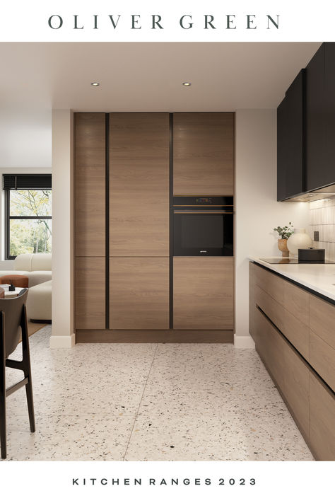 Kitchen brochure cover showing modern handleless kitchen in light oak and carbon black Tall Units In Kitchen, Kitchen Tall Units, Integrated Oven, Bathrooms Tiles, Tall Unit, Kitchen Slab, Kitchen Styling Modern, Green Kitchens, Storage Solutions Bedroom