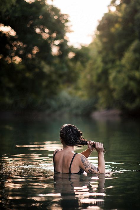 Young woman swimming in a creek Swimming River, River Bath, Woman Swimming, Swimming Photography, Swimming Photos, Lake Swimming, Underwater Portrait, Lake Photoshoot, Water Shoot