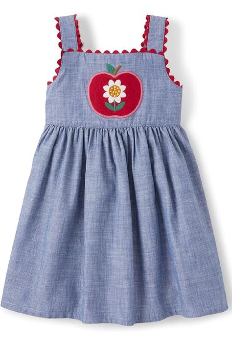 A playful cotton chambray dress with ric rac trim and apple embroidery, perfect for twirling through the orchard!  Embroidery: Apple with daisy design.  Features: 100% cotton, fully lined, buttons at back, ric rac shoulder trim, empire waist, knee-length. Includes diaper cover for sizes 3T and under.  Apple Orchard: Cute and comfy looks from our Apple Orchard Collection!  Gymboree: Celebrate childhood with our fun, detailed clothing! *this is an affiliate post Gymboree Girl Outfits, Apple Embroidery, Gymboree Girl, Apple Orchard, Big Fashion, Diaper Cover, Girls Outfits, Back To School Outfits, Short Girls