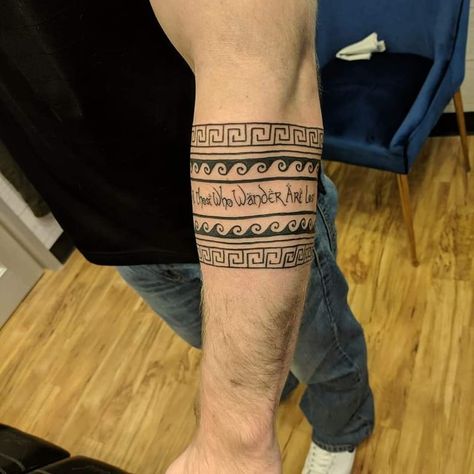 Black and White tattoos, band tattoos, tribal tattoos, men's forearm tattoo, LOTRs, "not all those who wander are lost" Hawaii Tattoo Men, Men's Forearm Tattoos, Tattoos Band, Feather Tat, Papa Tattoo, Lost Tattoo, Hawaii Tattoo, Black And White Tattoos, Simple Tats