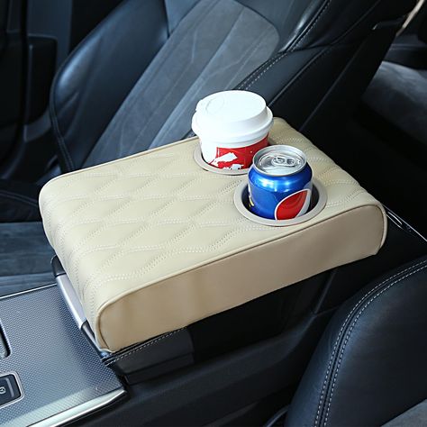 PRICES MAY VARY. 【New design】: Car Armrest Cushion with Cup Holder(3.14 Inch).Family and friends use cup holders for coffee, drinks, water cups,They will enjoy riding in your car. 【Dimension】:Car Armrest Cover(12.5*8.6*2.75 Inch) which fits the center console of most vehicles, SUVs, trucks, cars, vans, cars . Before placing an order, you should measure your car console before making a decision. 【High Quality】: Automobile armrest cover is made of high-quality micro fiber leather, which is very th Winter Car Accessories, Car Console Cover, Amazon Car Must Haves, Car Must Haves, Clean Car Mats, Must Have Car Accessories, Amazon Items, New Car Accessories, Car Console