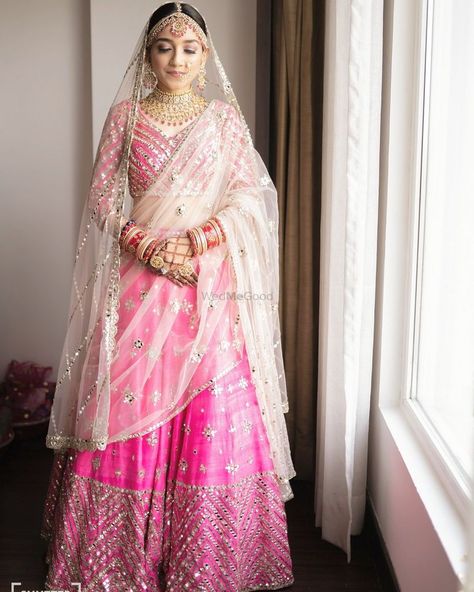 Photo of Bride wearing a bright pink lehenga with a white dupatta. White And Pink Lehenga, Photo Of Bride, White Dupatta, Lehenga Jewellery, Pink Lehenga, Wedding Register, Bridal Photos, Popular Wedding, Bride Wear