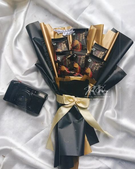 Dark fantasy bouquet 🤎 . Gift this prettiest bouquet for your close ones! Can be customised with any kind of chocolates or snacks ! . DM us for orders & queries. 📍 Khan graphics sirsi +91 8095439817 . . . . . . . . . . . . . #bouquet #chocolatebouquet #weddingbouquet #engagementgifts #custombouquet #customgifts #darkfantasy #biscuitbouquets #snackslove #snackbouquet #custommade #trulycustomised Chocolate Bouquet Ideas Creative, Fantasy Bouquet, Snacks Bouquet, Chocolate Bouquet Ideas, Girly Christmas Gifts, Chocolate Bouquet Diy, The Best Aesthetic, Wedding Invitation Background, Girly Christmas