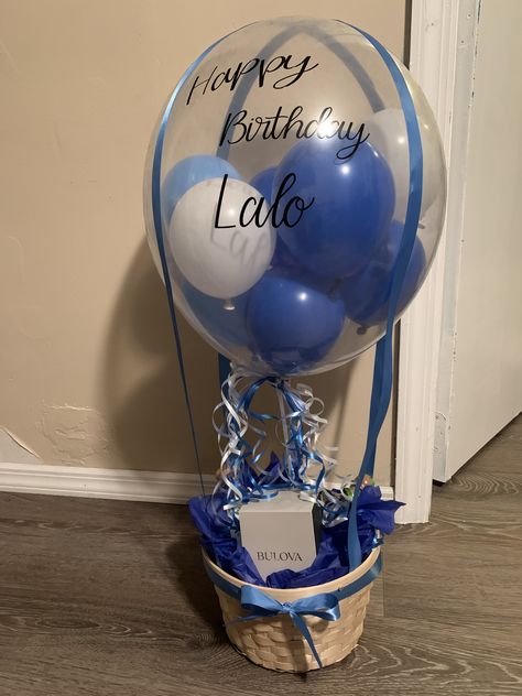 Hot air balloon gift basket for men Balloon Gift Basket For Him, Bobo Balloon Ideas For Men, Birthday Balloon Ideas For Him, Gift Basket With Balloons, Balloon Bouquet For Men, Bobo Balloon Gift Basket, Birthday Balloons For Men, Hot Air Balloon Gift Basket, Hot Air Balloon Gift Basket Birthday