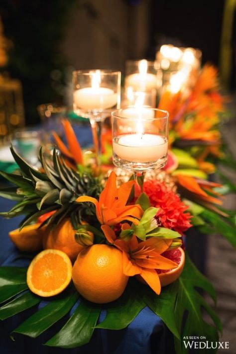 The Magic Of Madeira - WedLuxe Magazine Tropical Fruit Centerpiece Wedding, Tropical Fruit Centerpieces, Wedding Fruit Centerpiece, Low Tropical Centerpiece, Birds Of Paradise Wedding Centerpieces, Fruit Wedding Table Decor, Fruit Table Ideas Wedding, Tropical Fruit Wedding, Madeira Photography