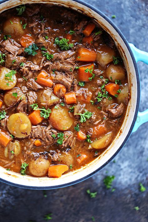 This Guinness Beef Stew recipe is made on the stovetop in a Dutch oven and packed with flavour. Whip up a batch for St. Patrick's Day or any day you're craving a delicious bowl of comfort food! Beef Stew In The Oven, Guiness Beef Stew Recipe, Stew In The Oven, Stew Recipes Stove Top, Dutch Oven Beef Stew Recipes, Beef Stew Recipe Oven, Irish Beef Stew Recipe, Dutch Oven Soup, Beef Stew Healthy