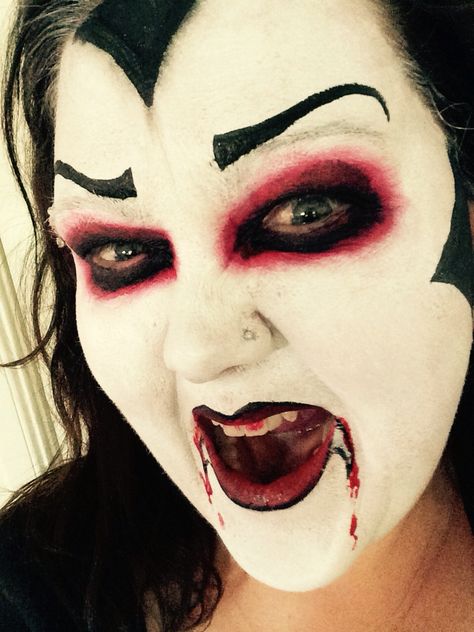 Female Dracula  Painted by Alexandra Gear  Splash of colour face painting Vampire Face Painting, Dracula Face Paint, Female Dracula, Face Painting Ideas For Adults, Painting Ideas For Adults, Vampire Face Paint, Halloween Face Painting Ideas, Scary Face Paint, Zombie Face Paint