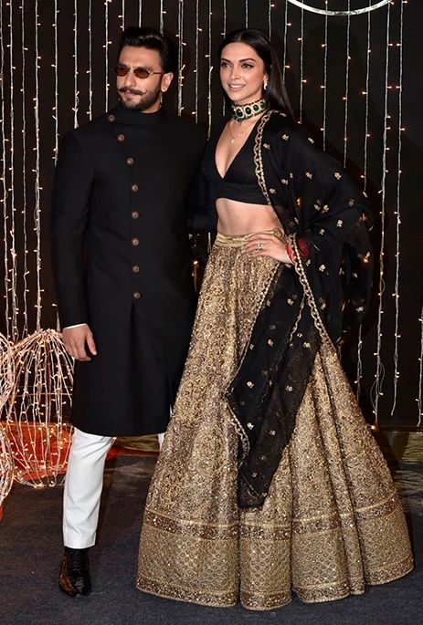 Gold Lehengas Bridal wear Bridal lehenga Bridal design Bridal look Bridal ideas Bridal golden lehenga reception wear Celebrity wedding Celebrity couple indian wedding wedding wear bridal dressing ideas bridal dressing wedding ideas Bridal outfit Indian weddings Indian wedding concepts Wedding concepts Black And Gold Lehenga, Diwali Fashion, Golden Lehenga, Sangeet Outfit, Reception Outfit, Sabyasachi Lehenga, Black Lehenga, Indian Outfits Lehenga, Traditional Indian Outfits