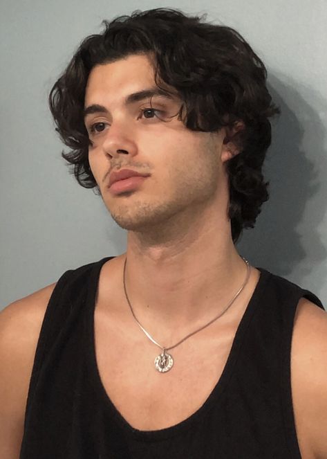 Mens Long Haircut Round Face, Haircuts For Men With Long Faces, Feathered Middle Part Hair Men, Wavy Hair Hairstyles Men, Wavy Hair Men Medium, Hispanic Male Face Claims, Christopher Volz, Men Wavy Haircut, Mens Curly Hairstyles Short