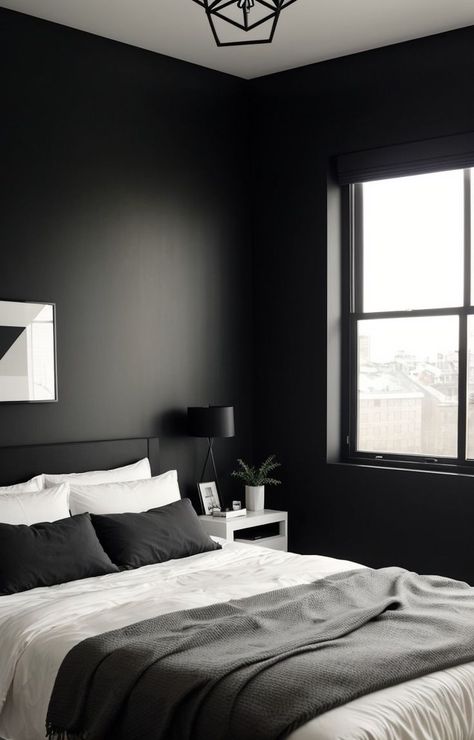 Create a sleek and sophisticated dark minimalist bedroom by opting for a black platform bed and matching furniture. Add in some geometric wall art and a statement pendant light to elevate the overall aesthetic. Black Minimalist Room, Black Wall Bedroom, Attic Bedroom Ideas Angled Ceilings, Dark Minimalist Bedroom, Minimalist Apartment Interior, Mens Room Decor, Black White Bedrooms, White Bed Set, Modern Apartment Decor