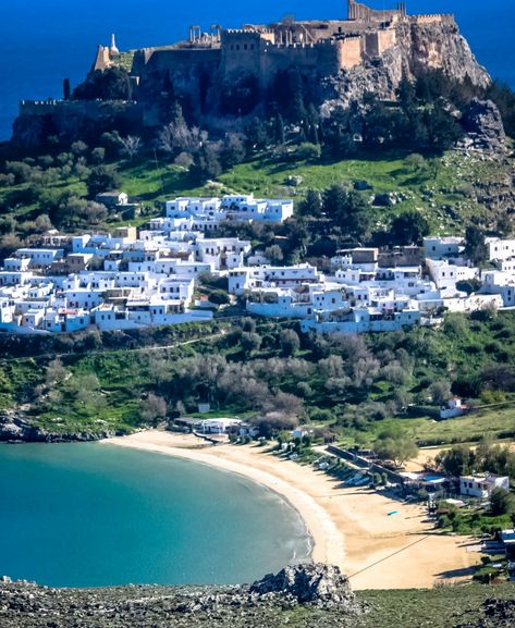 The Beach and Acropolis in Lindos Rhodes Greece Mediterranean Resort, Rhodes Town, Lindos Rhodes, Grecia Santorini, Greece Rhodes, Dodecanese Islands, Rhodes Island, Greek Travel, Places In Greece