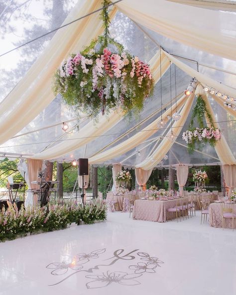 These romantic wedding drapes are giving us all the warm fuzzies with their whimsical swoops, calligraphed messages and colorful accents. If you want some wedding decor ideas to jazz up your ceremony or reception, you have certainly come to the right place! Get ready to see why this wedding trend is on the up and up over on #ruffledblog Tented Winter Wedding, Pastel Reception, Wedding Tent Decorations, Chandelier Decorations, Destination Wedding Decor, Rustic Wedding Decorations, Tent Decorations, Wedding Venue Decorations, Wedding Tent