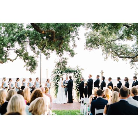 Bride and groom at alter during the ceremony. Bride And Groom Alter, Bride And Groom With Officiant, Groom Waiting For Bride At Alter, Bride And Groom At Alter, Bridal Party Sitting During Ceremony, Ceremony Pictures Wedding, Groom At Alter, Processional Order, Bride And Groom Ceremony