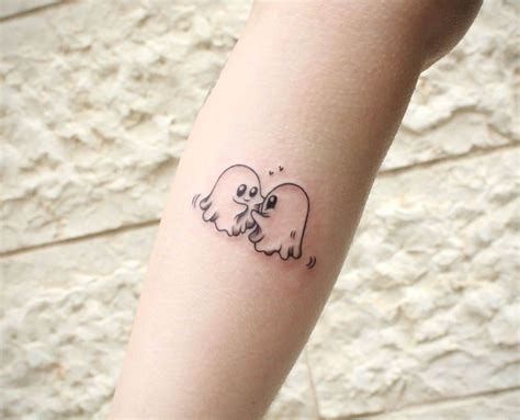 small halloween tattoos at DuckDuckGo Ghost Matching Tattoos, Ghosts Tattoo, Tattoos Ghost, Ghost Tattoo Ideas, Father Son Tattoo, Ghost Couple, Fandom Tattoos, Tattoos Couples, Typography Tattoo