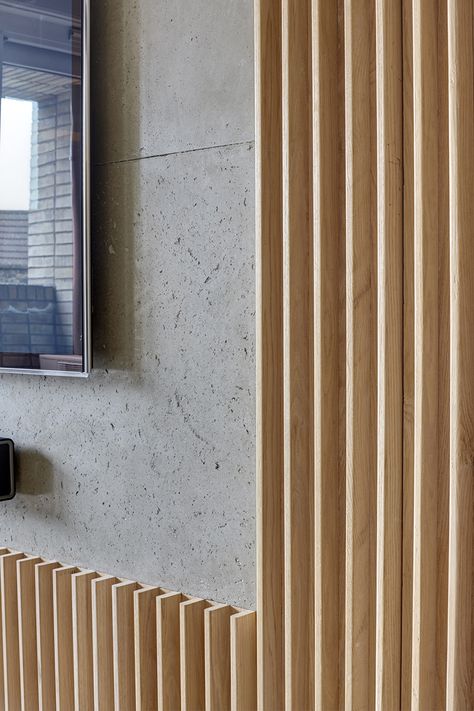 Interior Design Idea - A Section Of This Wood Covered Wall Was Left Empty For The TV Wood Wall Covering, Apartment Studio, Timber Walls, Hakone, Wood Cover, Loft Apartment, Slat Wall, Wall Cladding, Concrete Wall