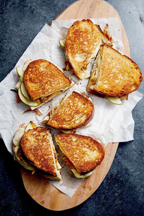 Grilled cheese sandwiches are comforting enough on their own, but when you add apple and turkey, it's a fall treat. This delicious fall sandwich gets all melty from gouda or white cheddar cheese while getting a bit of crunch from fresh apple slices and sweet onions. #sandwichrecipes #sandwichideas #easyrecipes #bhg Winter Sandwiches, Fall Sandwiches, Grilled Sandwich Recipe, Apple Sandwich, Grilled Sandwiches, Classic Grilled Cheese, Grilled Cheese Sandwiches, Best Grilled Cheese, Hot Sandwich