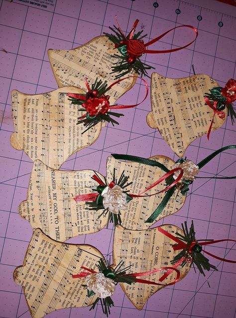 Hymnal Pages Crafts, Christmas Book Page Crafts, Hymn Ornaments Diy, Old Hymnal Crafts, Crafts Using Hymnal Pages, Crafts With Hymnal Pages, Hymnal Page Crafts, Christmas Bells Craft, Crafts Using Old Hymnal Pages