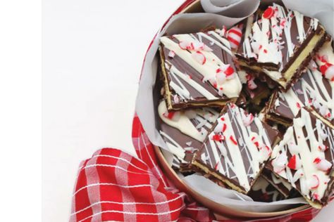 Peppermint Nanaimo Bars - ParentsCanada - Canada's Leading Parenting Website Naniamo Bars, Nanimo Bars, Peppermint Coffee, Peppermint Extract, Nanaimo Bars, Ski Hill, Dessert Tray, Cheesecake Brownies, Skating Rink