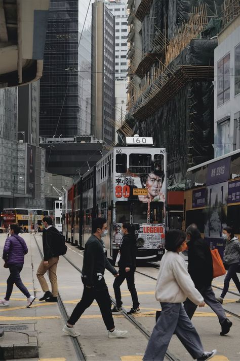 people walking on street near red tram during daytime photo – Free Sheung wan Image on Unsplash People Walking On Street, Bird Soaring, Urban Street Photography, Street Photography People, Walking Poses, Walking People, Drawing Cartoon Faces, City People, Image Film