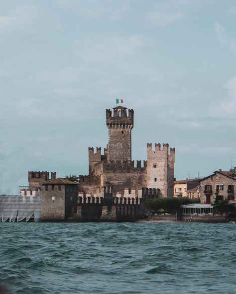 #castle #medieval #italian #palace #mansion #asylum #tower #flag #italy #sea #ocean #travel #trip #swimming #cruise Medieval Ocean Aesthetic, Sea Castle Aesthetic, Castle By The Sea Aesthetic, Sea Kingdom Aesthetic, Ocean Castle Aesthetic, Seaside Castle, Italian Palace, Sea Palace, Castle By The Sea