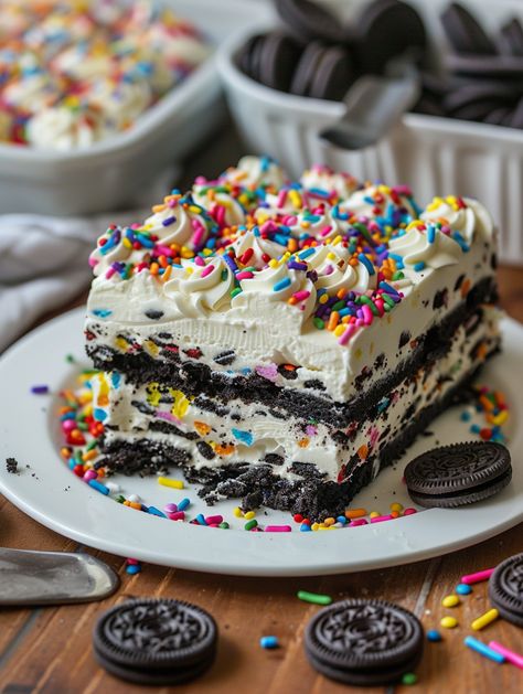 Funfetti Oreo Icebox Cake 🍫   𝗜𝗻𝗴𝗿𝗲𝗱𝗶𝗲𝗻𝘁𝘀: - 1 package (14.3 oz) Oreo cookies - 1 cup heavy cream - 1 cup powdered sugar - 8 oz cream cheese, softened - 1 teaspoon vanilla extract - 1/2 cup rainbow sprinkles - 1/2 cup mini chocolate chips (optional) Funfetti Oreo, Cake Dragon, Cookies Cream Ice Cream, Oreo Icebox Cake, Sprinkles Ice Cream, Ice Cream Cake Recipe, Pretty Dessert, Icebox Cake, Edible Food