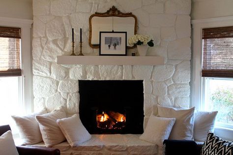 Painted Stone Fireplace.  Favorite white paint color:   Benjamin Moore, Cloud White Painted Stone Fireplace, Stone Fireplace Makeover, River Rock Fireplaces, Rock Fireplace, Fireplace Redo, Stacked Stone Fireplaces, Fireplace Update, Paint Fireplace, Rock Fireplaces