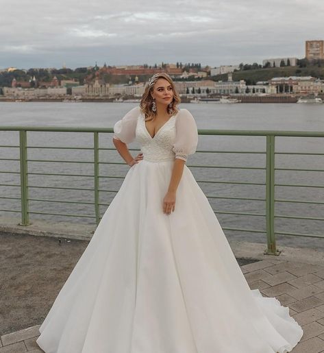 37 Best Plus Size Wedding Dresses for Flattering Curvy Brides Puffy Sleeves Wedding Dress, Wedding Dress With Puffy Sleeves, Curvy Bride Dress, Plus Size Wedding Dresses With Sleeves, Sleeves Wedding Dress, Wedding Dress With Sleeves, Plus Wedding Dresses, Big Wedding Dresses, Simple Wedding Gowns