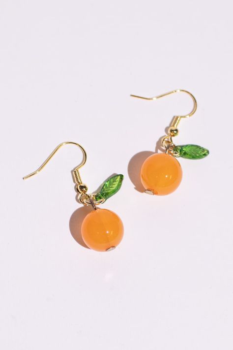 Orange Ya Glad Earrings Check more at https://ragstock.com/shop/orange-ya-glad-earrings/ Orange Fruit Earrings, Orange Earrings Aesthetic, Earring Photography Ideas, Ethereal Jewelry, Orange Accessories, Diy Earrings Easy, Orange Jewelry, Noah Kahan, Fruit Jewelry