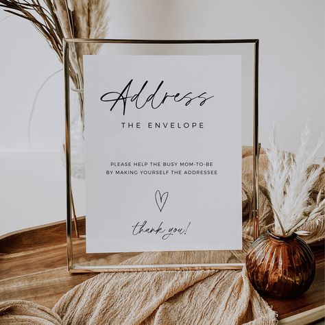 "EVERY PURCHASE COMES WITH A FREE 7 PAGE WEDDING CHECKLIST Also, please enjoy 60% off this item when you copy and paste the link below. https://lovelanepress.ck.page/discountcode -------------- DESCRIPTION -------------- Make your baby shower truly special with our modern minimalist \"address the envelope\" baby shower sign. This fully editable template puts the creative control in your hands, allowing you to customize every detail to match your unique style. Embrace the elegance of the modern minimalist design as you prepare to celebrate the upcoming shower. With this template, you can effortlessly create a chic and personalized sign that will add a touch of sophistication to your event. Let your creativity shine and craft an envelope addressing station that will leave a lasting impressio Neutral Baby Shower Decor, Baby Shower Signage, Page Wedding, Shower Flowers, Envelope Addressing, January Wedding, Baby Shower Sign, Modern Minimalist Design, Shower Sign