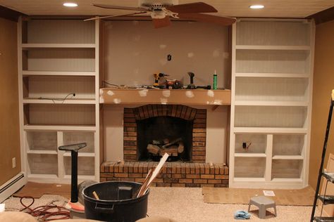 brick wall fireplace makeover | rd day. 4 – 42 inch cabinets are used on the bottom for hiding the ... Building Bookshelves, Shelves Around Fireplace, Bookshelves Around Fireplace, Diy Built In Shelves, Fireplace Renovation, Diy Bookshelves, White Mantle, Billy Ikea, Diy Fireplace Makeover