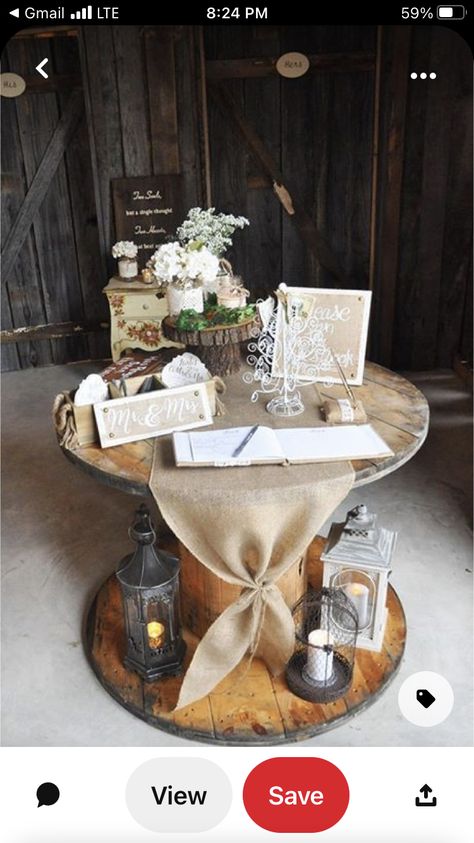 Rustic Wedding Guest Gifts, Rustic 50th Wedding Anniversary Party Ideas, Cable Reel Wedding Ideas, Rustic Wedding Reception Table Ideas, Elegant Country Wedding Centerpieces, Wedding Spool Tables, Wedding Spools Decoration, Western Wedding Gift Table, Wooden Spool Wedding Ideas