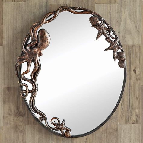 PRICES MAY VARY. 60 Day No Hassle Returns Exclusive - Cast iron sculptural details in a bronze finish. This coastal mirror measures 21 1/2"W x 2"D x 26"H. Coastal Mirrors, Octopus Decor, Mermaid Bathroom, Farmhouse Side Table, Oval Wall Mirror, Room Transformation, Length Mirror, A Mirror, Wall Mirrors