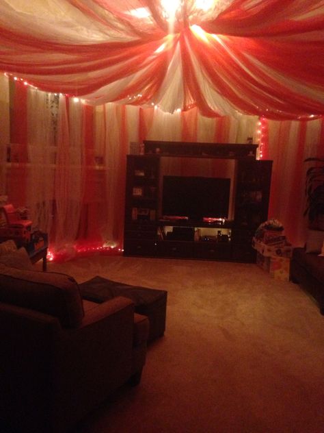 Living room circus tent- 12 bolts of white, 12 bolts of red. Clown Living Room, Circus Living Room, Tent Living Room, Carnival Home Decor, Circus Tent Interior, Clown Themed Room, Circus Room Aesthetic, Clown Room Aesthetic, Circus Home Decor