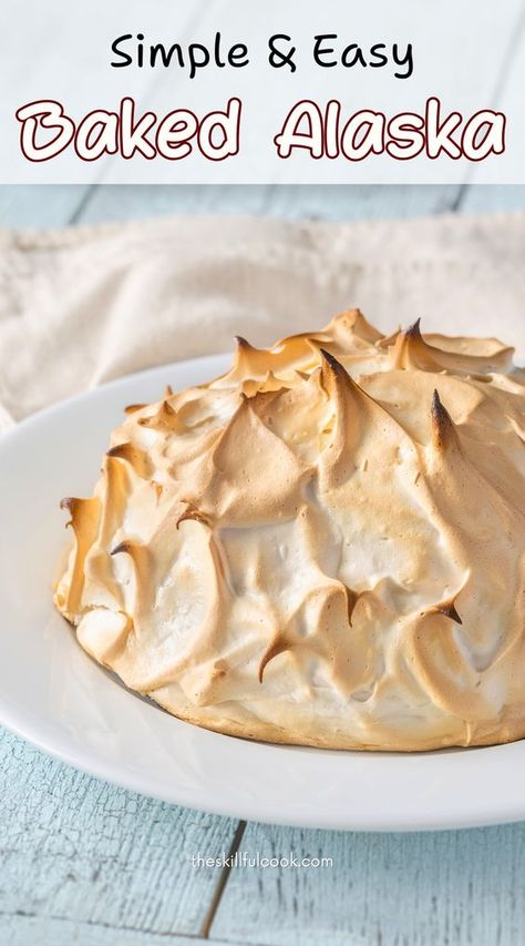 Create a show-stopping dessert with this Baked Alaska Recipe! Perfect for fall and winter desserts, this Raspberry Baked Alaska has layers of sponge cake and ice cream topped with toasted meringue. With its festive flair, this Christmas Baked Alaska impresses every guest. Whether a classic Baked Alaska Flambe or a fun twist on Alaska Cake, this Alaska Dessert is sure to dazzle at any occasion! Bake Alaska Cake, Baked Alaska Flambe, Alaska Dessert, Alaska Cake, Baked Alaska Recipe, Toasted Meringue, Cake And Ice Cream, Baked Alaska, Lemon Ginger