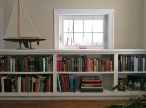 Built in bookcase under awning window Low Bookcase Under Window, Under Window Bookshelf, High Windows, Low Bookcase, Wooden Books, Home Libraries, Built In Bookcase, Built In Shelves, Kitchen Shelves