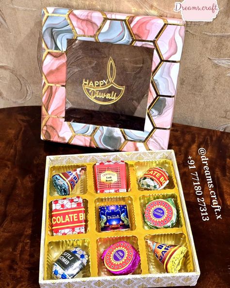 Diwali chocolate hamper ✨️ Premium Hardcase boxes, heavy quality with happy diwali acrylic, random design accordingly to availability. Box Size - 6 inches by 6 inches Total 9 chocolates 2 Anar 2 chakri 1 ladi bomb cube 1 sutli bomb 1 chocolate bomb 2 happy diwali cubes Majorly Chocolate flavours - Dark chocolate/ Pan / strawberry/ Milk - mix will come. #diwalihampers #diwalichocolates #chocolate #firecrackerschocolates #diwaligifts Chocolate Hampers, Chocolate Bomb, Diwali Gifts, Strawberry Milk, Happy Diwali, Chocolate Flavors, Diwali, Chocolates, Dark Chocolate