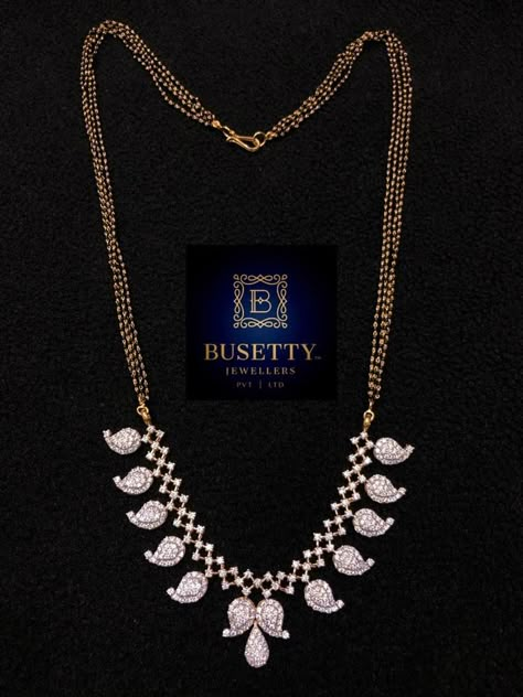 Multi strand nallapusalu chain with mango pendant studded with cz stones by Busetty Jewellers. mangalsutra chain models Mango Design, Mangalsutra Design, Zardosi Work, Black Beads Mangalsutra, Black Beads Mangalsutra Design, Diamond Pendants Designs, Diamond Mangalsutra, German Silver Jewelry, Gold Mangalsutra Designs