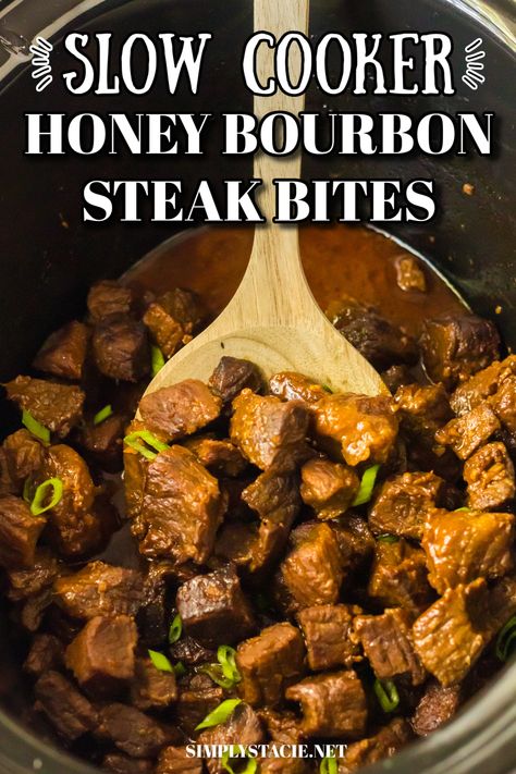 Image of honey bourbon steak bites in a slow cooker with a wooden spoon. Bourbon Beef Tips, Bourbon Steak Bites, Steak Bites Crockpot, Crockpot Steak Bites, Cooking With Bourbon, Asian Steak Bites, Bourbon Steak, Spicy Steak, Slow Cooker Appetizers