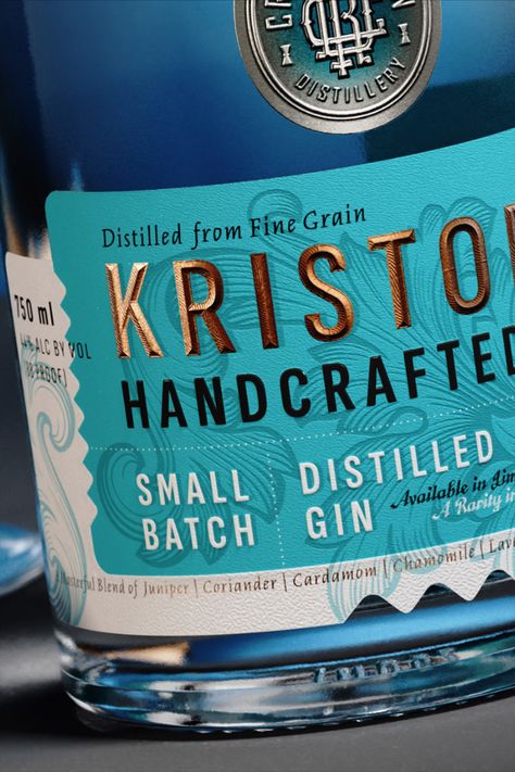 Lovingly decorated with gold and silver details, Crystal Rain Distillery's Kristone Craft Gin has all the shine of a mint. The Labelmaker made a liquor to show off with their beautifully textured design for the gin brand, accented with timeless floral details and an intricate monogram on the lid and bottle. Tequila Packaging Design, Whisky Label Design, Liquor Design, Gin Branding, Gin Labels Design, Gin Label, Gin Bottle Design, Gin Label Design Branding, Luxury Whisky Packaging