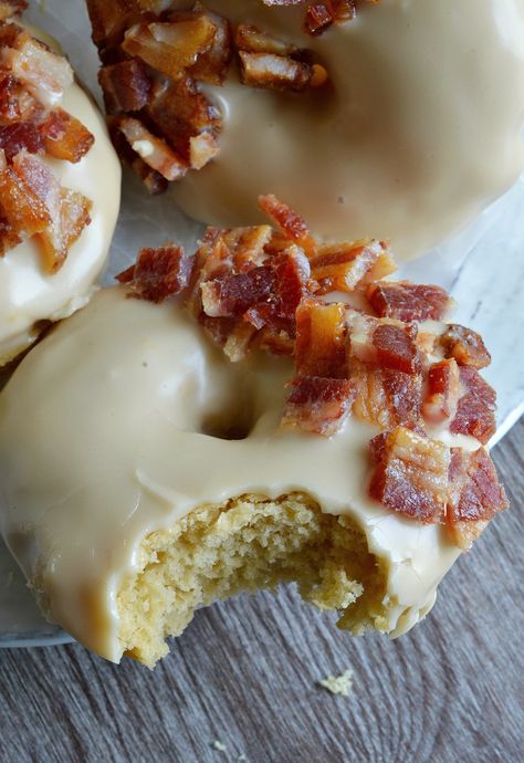 These Maple Bacon Donuts have to be one of the best flavor combinations ever! Brown sugar and sour cream baked donuts with a pure maple syrup glaze then topped with brown sugar maple glazed bacon pieces. This breakfast recipe is the ultimate morning indulgence and perfection with a cup of coffee! Maple Bacon Donut, Bacon Donut, Breakfast Casserole Bacon, Easy Donut Recipe, Easy Donuts, Canadian Bacon, Gateaux Cake, Homemade Donuts, Maple Bacon