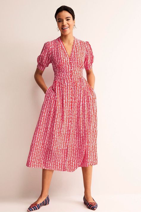 The Elsa Dress has all the classic features of a tea Dress including fabric covered buttons and a shaped waistband. But it's also been Boden-ified - aka we've added bright, colourful prints that you can't miss. Machine washable. 60% LENZING ECOVERO Viscose, 40% Viscose. Colourful Prints, Soft Gamine, Elsa Dress, Pink Abstract, Fabric Covered Button, Tshirt Skirt, Dress Shapes, Mid Length Dresses, Tea Dress