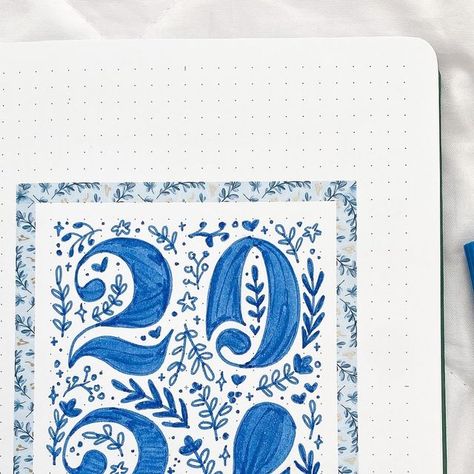 Syle Marie on Instagram: "2024 is around the corner and I’m excited to use my bullet journal! I went with a blue floral theme for the cover page 💙 It’s a bit time consuming so please give me strength as I try to finish setting up my January spreads~ Do you have any tips/tricks to staying consistent with a bujo? Get some % off with my codes ↓ ❥ @passionplanner: “SYLE MARIE213” ❥ @mariatalianplans: “MARIE15” #journal #bulletjournal #bujo #studygram #stationery #stationeryaddict #calligraphy #stickers"