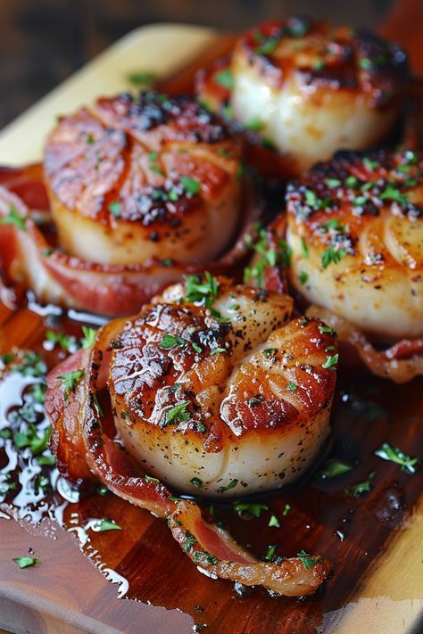 Indulge in a delectable dish with this bacon-wrapped scallops recipe. These savory bites are guaranteed to be a hit at your next gathering. The combination of crispy bacon and tender scallops creates a perfect blend of flavors that will leave your taste buds longing for more. Whether you're hosting a dinner party or simply looking to impress your loved ones with something special, these bacon-wrapped scallops are sure to be a crowd-pleaser. Smoked Bacon Wrapped Scallops, Bacon Wrapped Scallops Grilled, Baked Bacon Wrapped Scallops, Bacon Wrapped Scallops In Oven, Scallops Wrapped In Bacon, Broiled Scallops, Scallops With Bacon, Gourmet Bacon, Bacon Wrapped Scallops Recipe